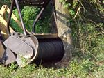 Mulcher Head in action – Turns tree into mulch in minutes